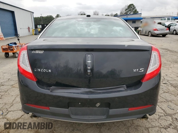 2013 Lincoln MKS z VIN 1LNHL9DKXDG612368, wystawiony jako Copart lot #48328215 z przebiegiem 108 788 mil mil oraz Szkoda całkowita • Salvage title. Historia ofert i sprzedaży dostępna na DreamBid. Obrazek 6.