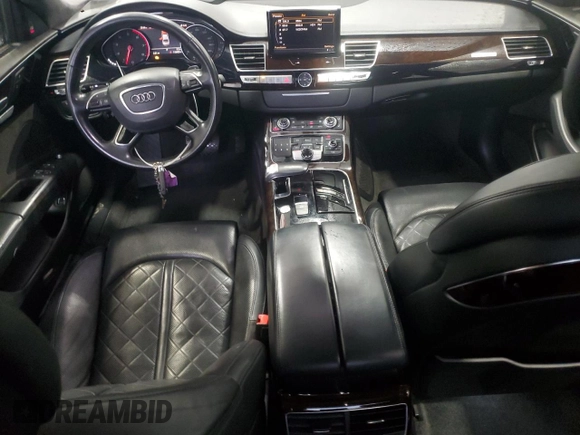 2017 Audi A8 Sport z VIN WAU43AFD4HN020515, wystawiony jako Copart lot #44953055 z przebiegiem 115 422 mil mil oraz Szkody całkowita. Historia ofert i sprzedaży dostępna na DreamBid. Obrazek 8.