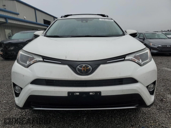 2018 Toyota RAV4 XLE with VIN JTMWFREV3JJ746262, listed as a Copart auction lot 51811035 with 84,319 mi miles and Salvage Title. Bid and sale history available at DreamBid. Image 5.