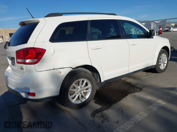 2015 Dodge Journey SXT with VIN 3C4PDCBG8FT673824, listed as a IAAI auction lot 41603661 with 169,939 mi miles and . Bid and sale history available at DreamBid. Image 4.