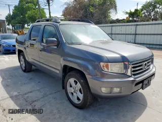 2014 Honda Ridgeline RTL z VIN 5FPYK1F53EB004694, wystawiony jako Copart lot #57222085 z przebiegiem 128 210 mil mil oraz Szkoda całkowita • Salvage title. Historia ofert i sprzedaży dostępna na DreamBid. Obrazek 4.