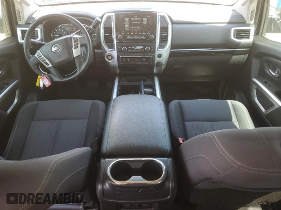 2021 Nissan Titan SV z VIN 1N6AA1EF6MN512596, wystawiony jako Copart lot #56140285 z przebiegiem 49 145 mil mil oraz Szkoda całkowita • Salvage title. Historia ofert i sprzedaży dostępna na DreamBid. Obrazek 8.