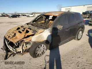 2015 Mazda CX-5 Touring with VIN JM3KE4CY4F0432335, listed as a Copart auction lot 83258294 with 0 mi miles and Non Repairable. Bid and sale history available at carsss.com. Image 1.