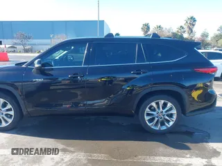 2021 Toyota Highlander Hybrid Limited with VIN 5TDYARAH8MS006883, listed as a IAAI auction lot 41507332 with 169,210 mi miles and . Bid and sale history available at DreamBid. Image 14.