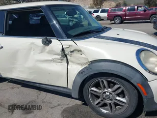 2011 MINI Hardtop with VIN WMWSU3C53BTX97140, listed as a IAAI auction lot 41861648 with 111,899 mi miles and . Bid and sale history available at DreamBid. Image 6.