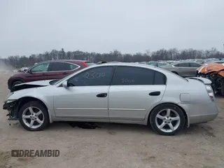 2005 Nissan Altima SE with VIN 1N4BL11E65C133566, listed as a IAAI auction lot 41792300 with 169,733 mi miles. Bid and sale history available at carsss.com. Image 14.