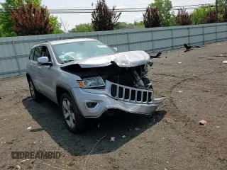 2014 Jeep Grand Cherokee Limited with VIN 1C4RJFBG9EC501136, listed as a Copart auction lot 59873595 with 203,819 mi miles and Salvage title. Bid and sale history available at DreamBid. Image 14.