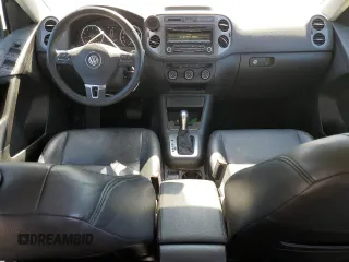 2014 Volkswagen Tiguan SE with VIN WVGAV3AX8EW619044, listed as a Copart auction lot 46990185 with 171,972 mi miles and Salvage title. Bid and sale history available at DreamBid. Image 8.