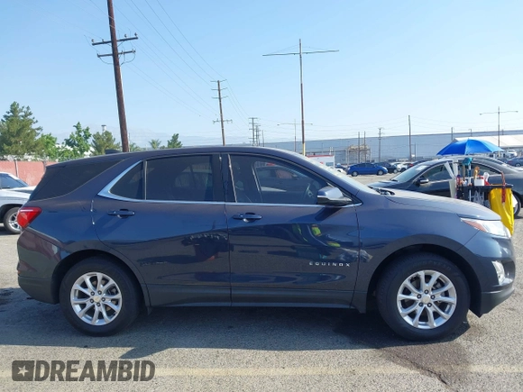 2018 Chevrolet Equinox LT with VIN 3GNAXJEV7JS536312, listed as a IAAI auction lot 42643403 with 168,673 mi miles and . Bid and sale history available at DreamBid. Image 14.