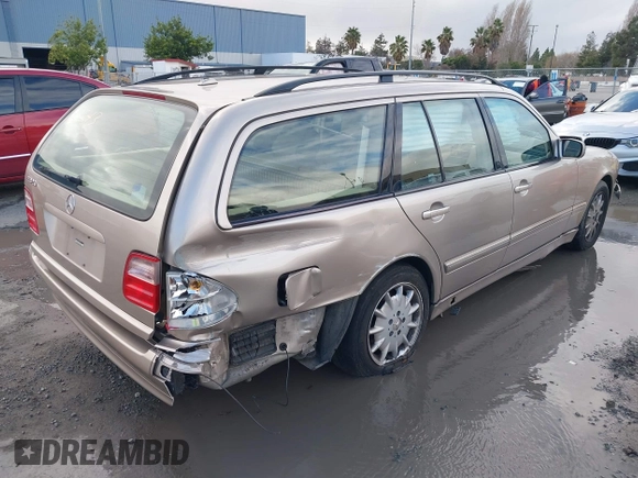 2001 Mercedes-Benz E-Class with VIN WDBJH65J41B349359, listed as a IAAI auction lot 41532318 with 96,375 mi miles. Bid and sale history available at carsss.com. Image 4.