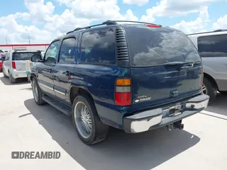 2005 Chevrolet Tahoe Z71 with VIN 1GNEC13T35R205945, listed as a IAAI auction lot 42584823 with 183,432 mi miles and . Bid and sale history available at DreamBid. Image 3.