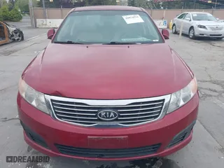2009 Kia Optima LX with VIN KNAGE228095312766, listed as a IAAI auction lot 42074522 with 183,240 mi miles. Bid and sale history available at carsss.com. Image 6.