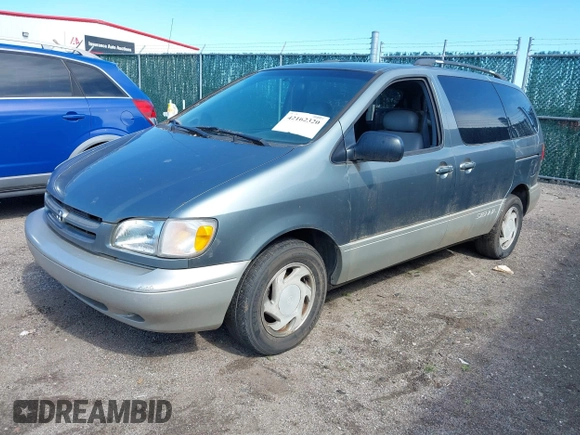 2000 Toyota Sienna LE with VIN 4T3ZF13C6YU173739, listed as a IAAI auction lot 42162320 with 173,659 mi miles. Bid and sale history available at carsss.com. Image 2.