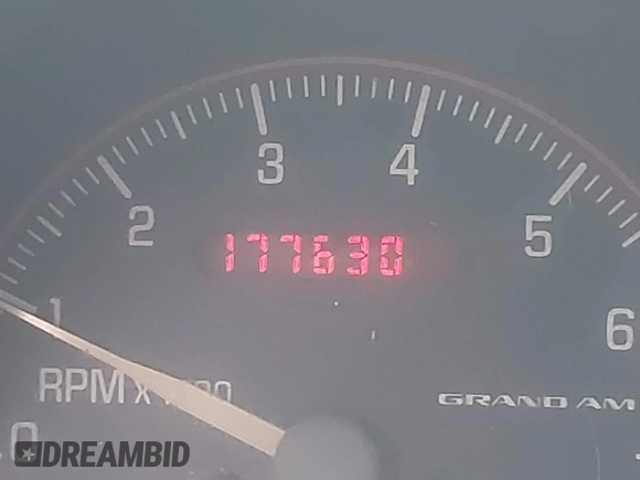 2002 Pontiac Grand Am SE1 z VIN 1G2NF52F82C203744, wystawiony jako IAAI lot #41770625 z przebiegiem 177 630 mil mil oraz . Historia ofert i sprzedaży dostępna na DreamBid. Obrazek 16.
