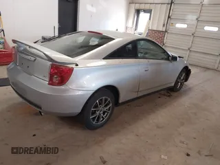 2003 Toyota Celica GT with VIN JTDDR32T330161995, listed as a IAAI auction lot 41437754 with 150,727 mi miles. Bid and sale history available at carsss.com. Image 4.