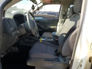 2024 Nissan Frontier Pro-4X with VIN 1N6ED1EK9RN637086, listed as a Copart auction lot 66204205 with 27,713 mi miles and Salvage title. Bid and sale history available at DreamBid. Image 7.