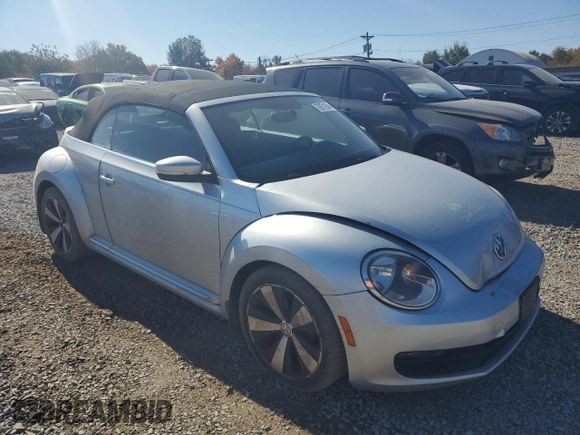 2013 Volkswagen Beetle 2.5L with VIN 3VW5P7ATXDM803952, listed as a Copart auction lot 76971934 with 211,449 mi miles and Salvage Title. Bid and sale history available at DreamBid. Image 4.