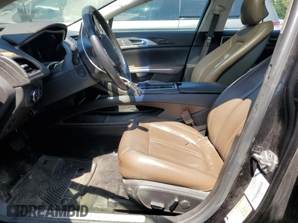 2013 Lincoln MKZ z VIN 3LN6L2J90DR818503, wystawiony jako Copart lot #54716715 z przebiegiem 114 227 mil mil oraz Szkoda całkowita • Salvage title. Historia ofert i sprzedaży dostępna na DreamBid. Obrazek 7.