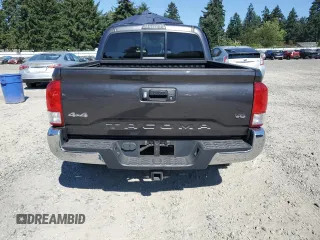 2017 Toyota Tacoma SR5 with VIN 3TMCZ5ANXHM052092, listed as a Copart auction lot 64898135 with 95,743 mi miles and Salvage title. Bid and sale history available at DreamBid. Image 6.