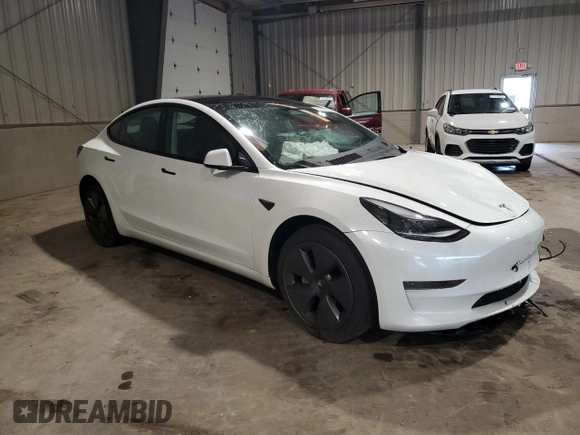2023 Tesla Model 3 with VIN 5YJ3E1EA6PF588701, listed as a Copart auction lot 61446355 with Not provided miles and Salvage title. Bid and sale history available at DreamBid. Image 4.