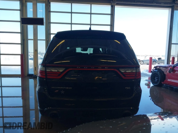 2021 Dodge Durango R/T with VIN 1C4SDJCT1MC788493, listed as a IAAI auction lot 41213673 with 80,287 mi miles and . Bid and sale history available at DreamBid. Image 16.