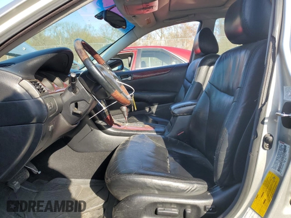 2002 Lexus ES 300 with VIN JTHBF30G420018931, listed as a Copart auction lot 51115275 with 292,777 mi miles and Salvage Title. Bid and sale history available at DreamBid. Image 7.