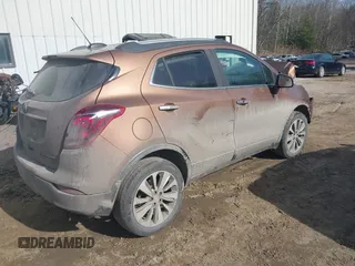 2017 Buick Encore Preferred with VIN KL4CJESB4HB124482, listed as a IAAI auction lot 41795609 with 91,139 mi miles. Bid and sale history available at carsss.com. Image 4.