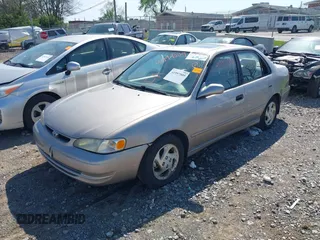 1998 Toyota Corolla VE z VIN 2T1BR18E2WC019524, wystawiony jako IAAI lot #41997009 z przebiegiem 255 968 mil mil oraz . Historia ofert i sprzedaży dostępna na DreamBid. Obrazek 2.