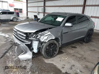 2023 Volkswagen Atlas SE z VIN 1V2HE2CA0PC222291, wystawiony jako IAAI lot #42431536 z przebiegiem 23 114 mil mil oraz . Historia ofert i sprzedaży dostępna na DreamBid. Obrazek 18.