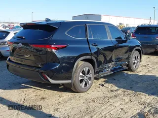 2024 Toyota Highlander LE with VIN 5TDKDRAH6RS051518, listed as a IAAI auction lot 41393093 with 23,305 mi miles and . Bid and sale history available at DreamBid. Image 4.