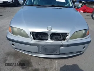 2002 BMW 3 Series 325i with VIN WBAET37492NG83135, listed as a IAAI auction lot 42028502 with 184,216 mi miles. Bid and sale history available at carsss.com. Image 6.