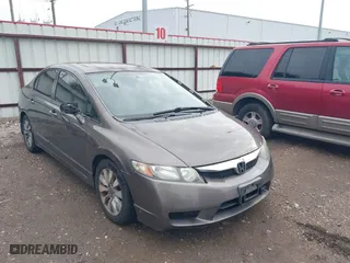 2010 Honda Civic Sdn EX with VIN 2HGFA1F89AH526670, listed as a IAAI auction lot 42132052 with 130,106 mi miles. Bid and sale history available at carsss.com. Image 1.