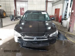2008 Mitsubishi Lancer DE with VIN JA3AU26UX8U015865, listed as a IAAI auction lot 41108329 with 131,884 mi miles. Bid and sale history available at carsss.com. Image 13.
