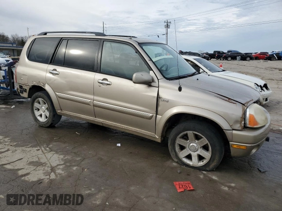 2002 Suzuki XL7 Standard z VIN JS3TX92V424130897, wystawiony jako Copart lot #84635434 z przebiegiem 208 447 mil mil oraz Szkoda całkowita • Salvage title. Historia ofert i sprzedaży dostępna na DreamBid. Obrazek 4.