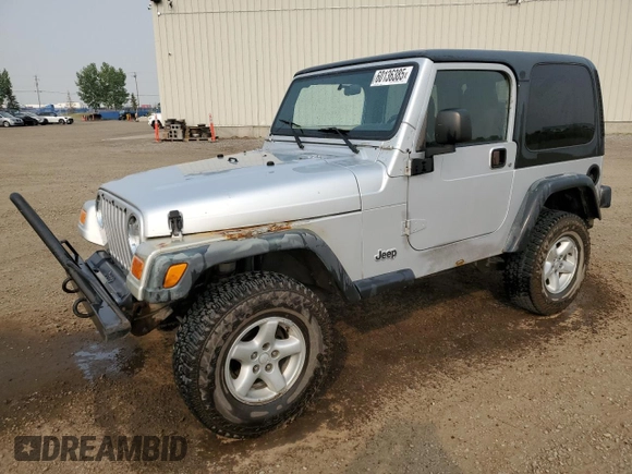2003 Jeep Wrangler Sport z VIN 1J4FA49S93P306817, wystawiony jako Copart lot #60136385 z przebiegiem 217 208 mil mil oraz Czysty tytuł • Clean title. Historia ofert i sprzedaży dostępna na DreamBid. Obrazek 1.