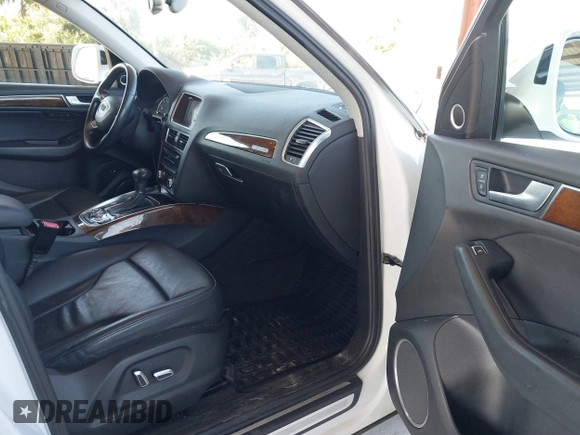 2015 Audi Q5 Premium Plus z VIN WA1LFAFP7FA059789, wystawiony jako IAAI lot #42574522 z przebiegiem 99 638 mil mil oraz . Historia ofert i sprzedaży dostępna na DreamBid. Obrazek 5.
