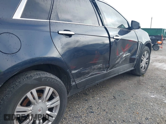 2014 Cadillac SRX with VIN 3GYFNAE38ES659362, listed as a IAAI auction lot 41971537 with 115,379 mi miles and . Bid and sale history available at DreamBid. Image 14.