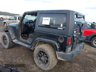 2014 Jeep Wrangler Sahara with VIN 1C4AJWBG5EL247812, listed as a IAAI auction lot 40909884 with 106,475 mi miles and . Bid and sale history available at DreamBid. Image 3.