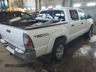 2013 Toyota Tacoma with VIN 3TMLU4EN2DM104490, listed as a IAAI auction lot 41636616 with 153,036 mi miles and . Bid and sale history available at DreamBid. Image 4.