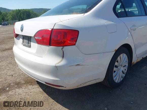 2012 Volkswagen Jetta SE with VIN 3VWDP7AJ0CM306577, listed as a IAAI auction lot 42585620 with 235,667 mi miles and . Bid and sale history available at DreamBid. Image 12.