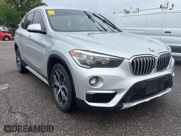 2018 BMW X1 sDrive28i with VIN WBXHU7C38J5L08773, listed as a Copart auction lot 55470955 with 149,885 mi miles and Clean Title. Bid and sale history available at DreamBid. Image 1.
