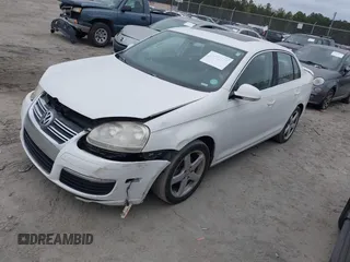 2009 Volkswagen Jetta Sedan SE with VIN 3VWRM71K99M068342, listed as a IAAI auction lot 41876215 with 161,633 mi miles. Bid and sale history available at carsss.com. Image 2.