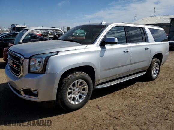 2016 GMC Yukon XL SLE with VIN 1GKS2FKC4GR285826, listed as a Copart auction lot 69486214 with 58,879 mi miles and Clean Title. Bid and sale history available at DreamBid. Image 1.