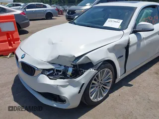 2014 BMW 4 Series 435i with VIN WBA3R1C52EF729201, listed as a IAAI auction lot 42579604 with 145,277 mi miles and . Bid and sale history available at DreamBid. Image 6.