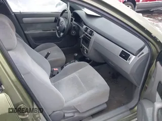 2004 Suzuki Forenza S z VIN KL5JD52Z64K027219, wystawiony jako IAAI lot #41799510 z przebiegiem Nie podano mil oraz . Historia ofert i sprzedaży dostępna na DreamBid. Obrazek 5.