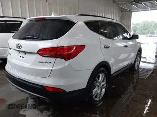 2013 Hyundai Santa Fe Sport z VIN 5XYZU3LAXDG030267, wystawiony jako IAAI lot #42233463 z przebiegiem 146 078 mil mil oraz . Historia ofert i sprzedaży dostępna na DreamBid. Obrazek 4.