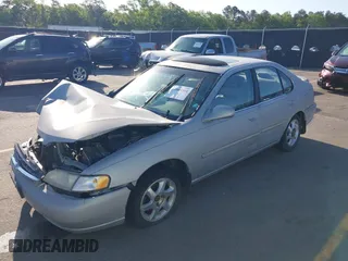 1999 Nissan Altima XE with VIN 1N4DL01D4XC252973, listed as a IAAI auction lot 42005504 with 247,570 mi miles. Bid and sale history available at carsss.com. Image 17.