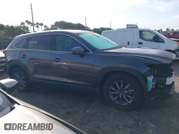 2020 Mazda CX-9 Touring z VIN JM3TCACY5L0412308, wystawiony jako IAAI lot #41208401 z przebiegiem 37 029 mil mil oraz . Historia ofert i sprzedaży dostępna na DreamBid. Obrazek 14.