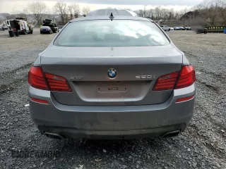2013 BMW 5 Series 550i xDrive with VIN WBAFU9C52DDY70256, listed as a Copart auction lot 53100075 with 176,876 mi miles and Salvage Title. Bid and sale history available at carsss.com. Image 6.