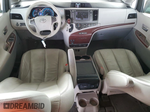 2012 Toyota Sienna XLE AAS with VIN 5TDYK3DC7CS275496, listed as a Copart auction lot 62612815 with 130,027 mi miles and Salvage title. Bid and sale history available at DreamBid. Image 8.